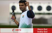 LONDON, ENGLAND - AUGUST 03: Vijay Kumar of India celebrates winning the silver medal in the Men's 50m Rifle Prone Shooting final on Day 7 of the London 2012 Olympic Games at The Royal Artillery Barracks on August 3, 2012 in London, England. (Photo by Lars Baron/Getty Images)