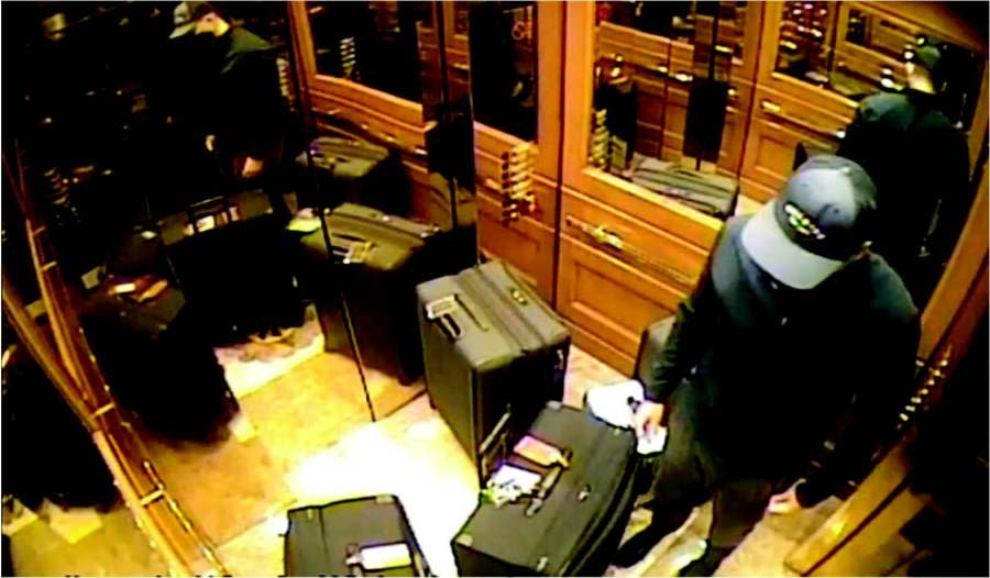 A screenshot from a hotel security footage shows Jobson Marangoni De Castro in a hotel elevator suitcases he stole from a hotel room on May 10, 2023. (United States Department of Justice)