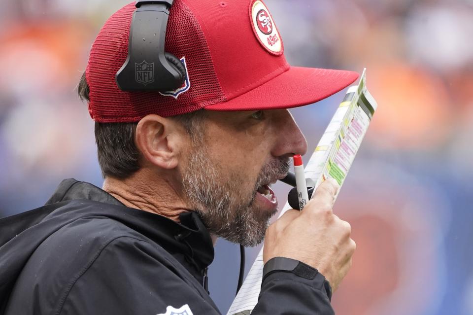 San Francisco 49ers head coach Kyle Shanahan calls a play during the first half of an NFL football game Sunday, Sept. 11, 2022, in Chicago. (AP Photo/Charles Rex Arbogast)