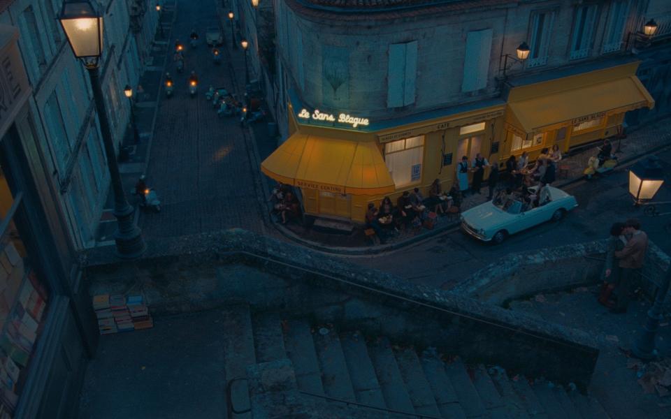 aerial view of cafe-bar at night (film still) - Photo Courtesy of Searchlight Pictures. © 2020 Twentieth Century Fox Film Corporation All Rights Reserved