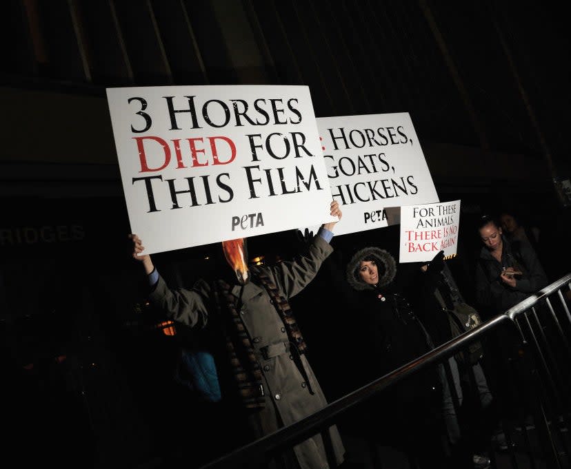 PETA activists protest the animal deaths and cruelty that occured during the filming of "The Hobbit: An Unexpected Journey"