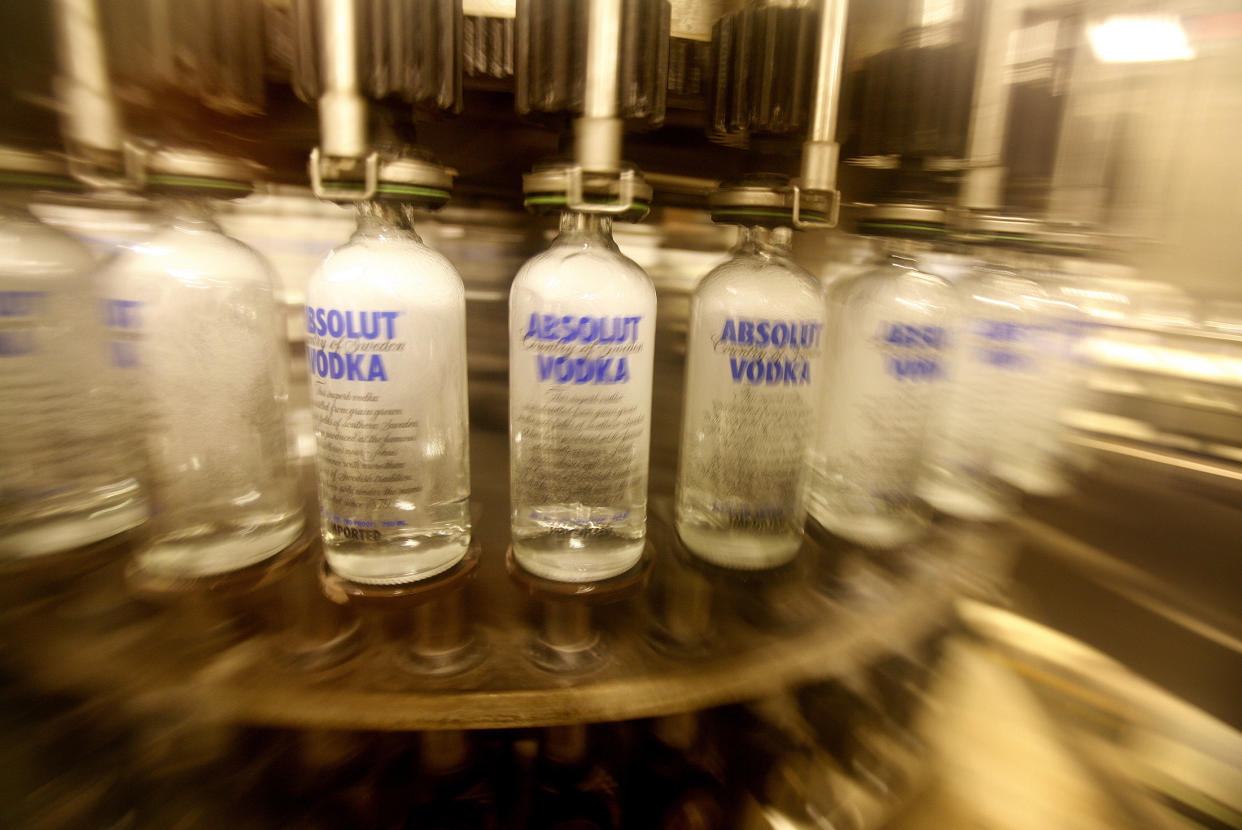 Empty bottles are washed on a production line at the Absolut bottling facility in Ahus in this photo taken July 17, 2007. The Swedish government passed a law in June allowing the sale of state-owned Absolut vodka maker Vin & Spirit, a sale which analysts expect to be worth $5 billion to $6 billion. Picture taken July 17, 2007.  REUTERS/Bob Strong (SWEDEN)