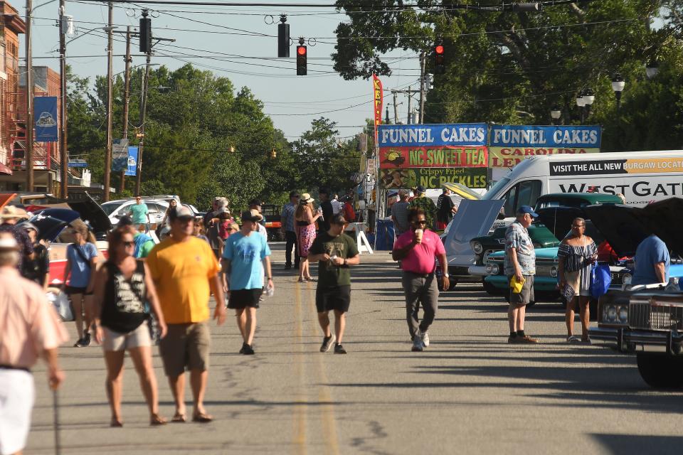 People enjoy a day of food and music in downtown Burgaw during the North Carolina Blueberry Festival in June. There could be more in the area as housing developments are being proposed.