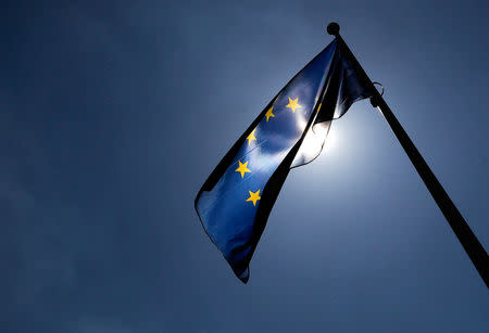 FILE PHOTO: A European Union flags flutters outside the EU Commission headquarters in Brussels, Belgium June 20, 2018. REUTERS/Yves Herman/File Photo