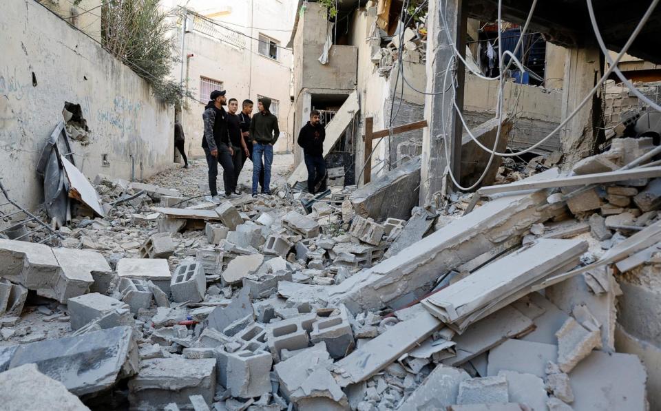 PHOTO: Palestinians check damage following a raid in Jenin in the Israeli-occupied West Bank, Nov. 29, 2023. (Raneen Sawafta/Reuters)