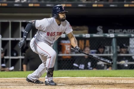 Aug 30, 2018; Chicago, IL, USA; Boston Red Sox center fielder Jackie Bradley Jr. (19) hits an RBI single during the ninth inning against the Chicago White Sox at Guaranteed Rate Field. Mandatory Credit: Patrick Gorski-USA TODAY Sports