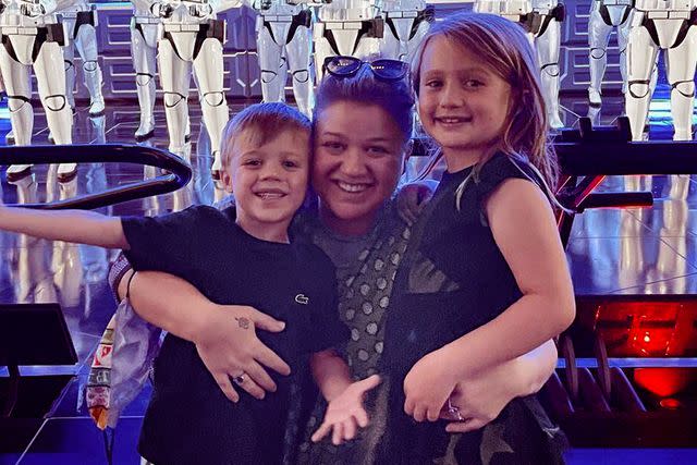 <p>Kelly Clarkson/Instagram</p> Kelly Clarkson with Remington and River in July 2021