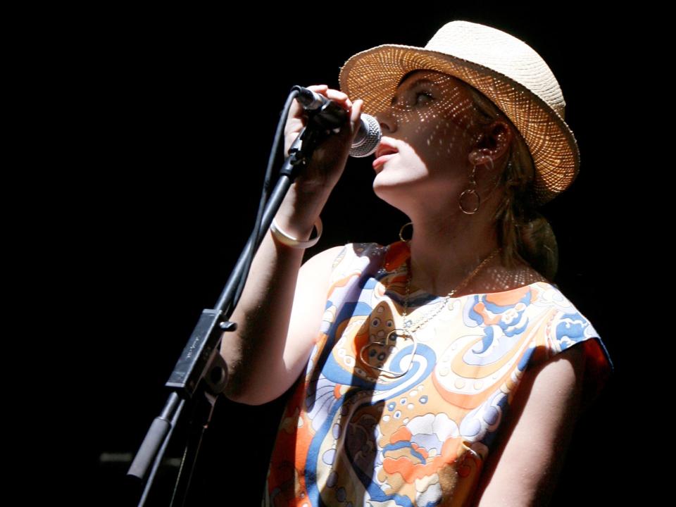 Scarlett Johansson sings with The Jesus And Mary Chain at Coachella Music Festival in 2007Getty Images