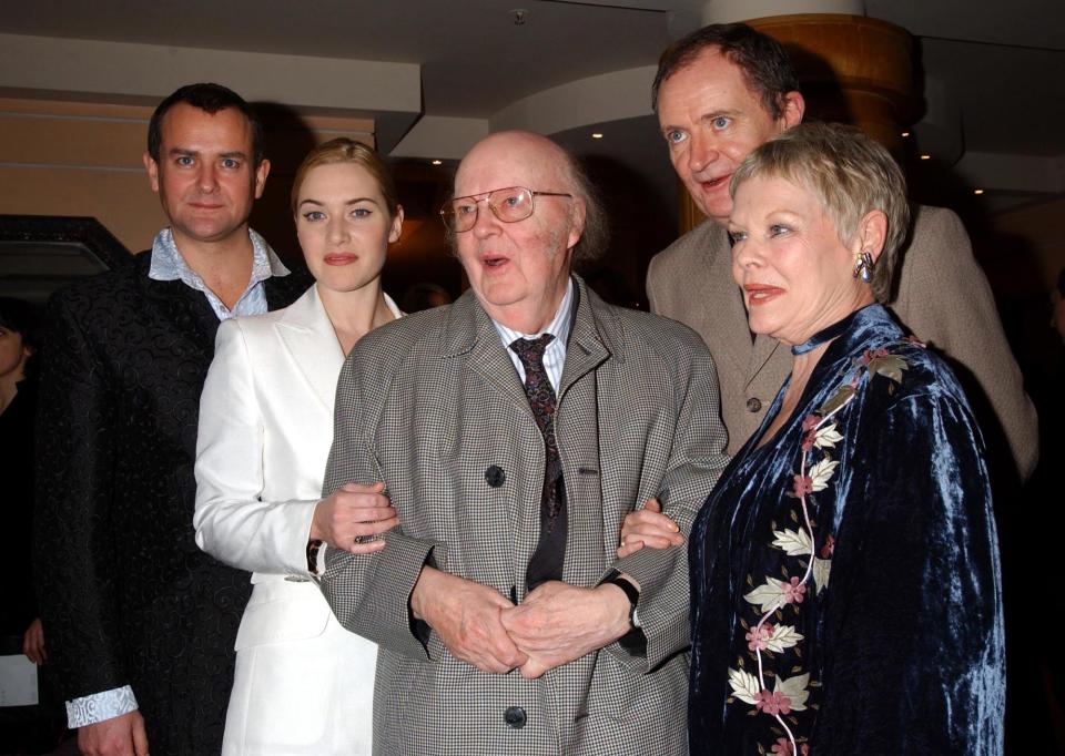 John Bayley (C) husband of the late Dame Iris Murdoch, with stars of the film, (L-R) Hugh Bonneville, Kate Winslet, Jim Broadbent and Dame Judi Dench during a press reception at the Washington Hotel in central London, ahead of the premiere of 'Iris' at the Curzon Mayfair. * The film follows the story of Booker Prize-winning novelist and philosopher Iris Murdoch who died in 1999, played by Kate Winslet and Judi Dench. (Photo by Yui Mok - PA Images/PA Images via Getty Images)