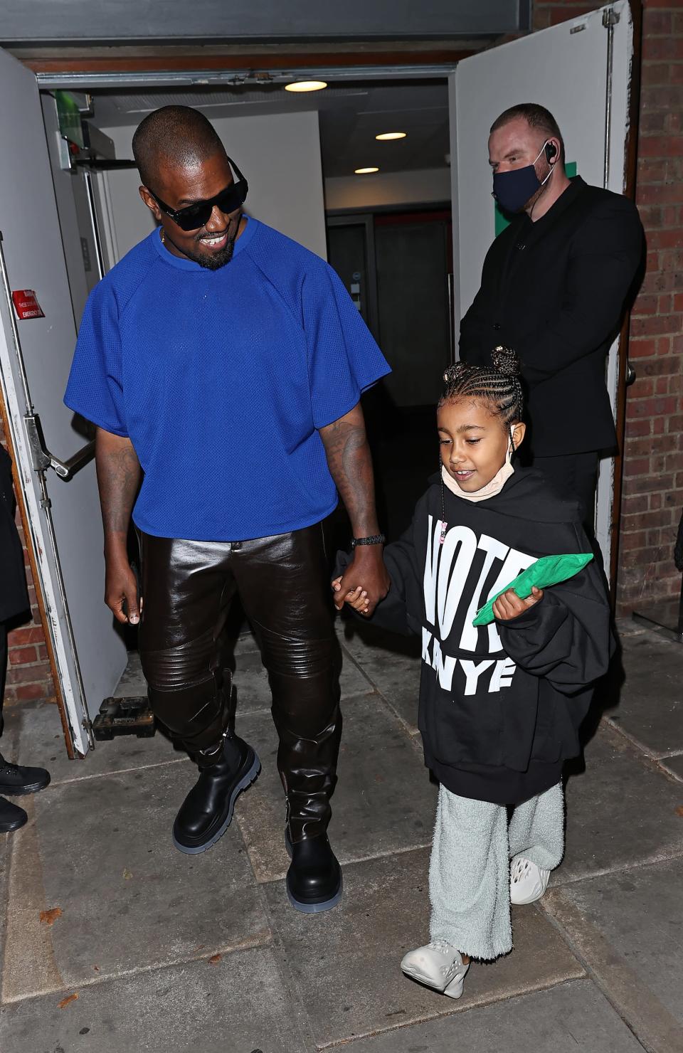 <p>Joining her father in London for the Bottega Veneta Salon 01 collection presentation, West kept casual yet cool in an oversized crewneck sweater that reads "Vote Kanye" on the front, light blue jeans, and Yeezy foam RNNRs.</p>