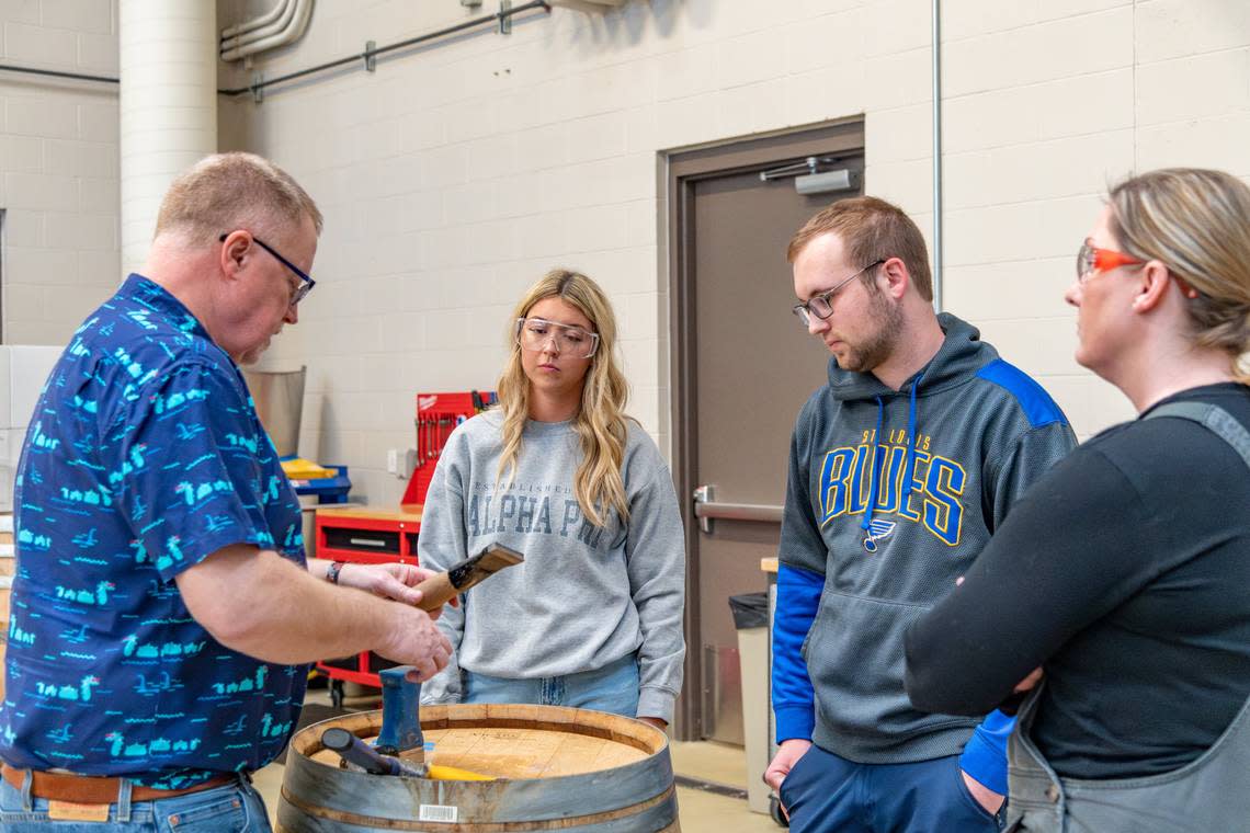 Students and staff in the Viticulture and Enology Department at WSU Tri-Cities deconstruct a wine barrel in April 2023. Courtesy Washington State University Tri-Cities