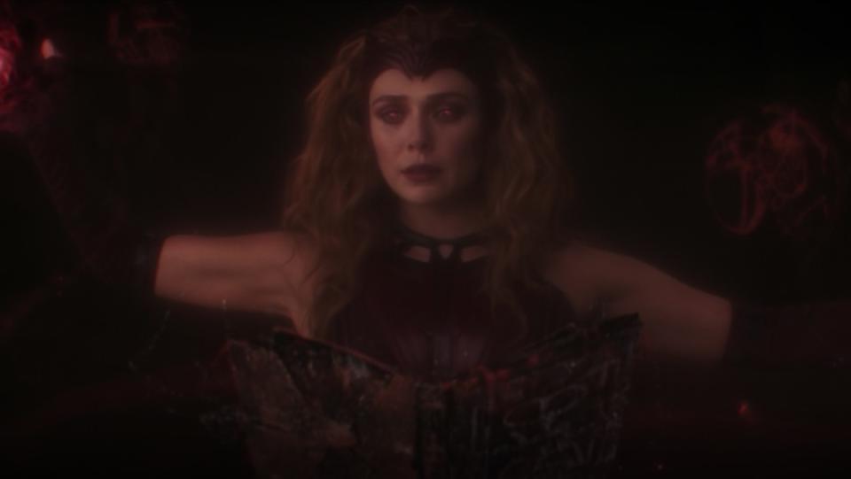 The Scarlet Witch reads a floating book that draws powers from the MCU's multiverse on WandaVision