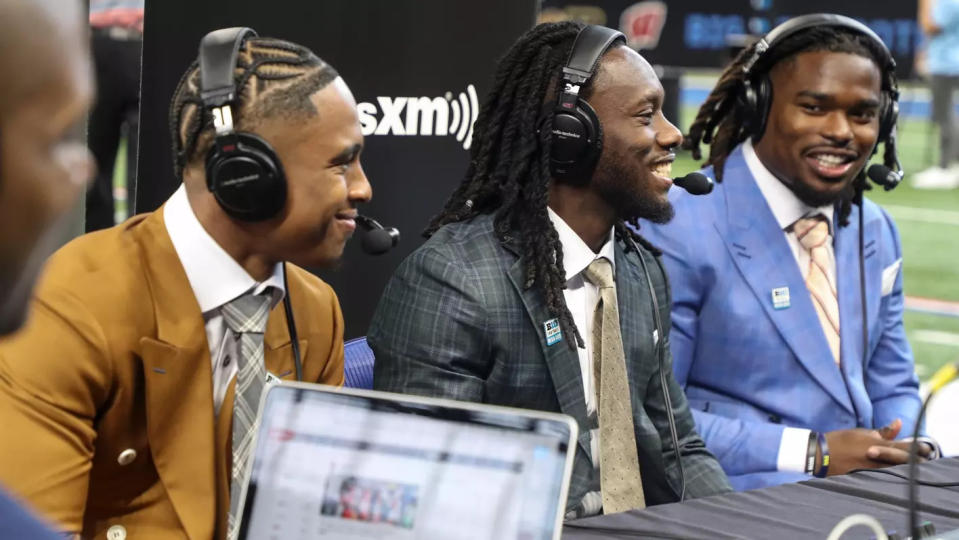 Indiana football players (from left to right) Jaylin Lucas, Noah Pierre and Aaron Casey do interviews on radio row at Big Ten Media Days on Thursday, July 27, 2023.