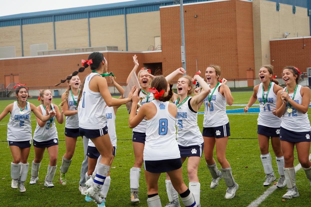 The Mount Notre Dame Cougars celebrate their 2-0 win over Ursuline Academy. Saturday, Oct. 28, 2023 at Fairmont High School.