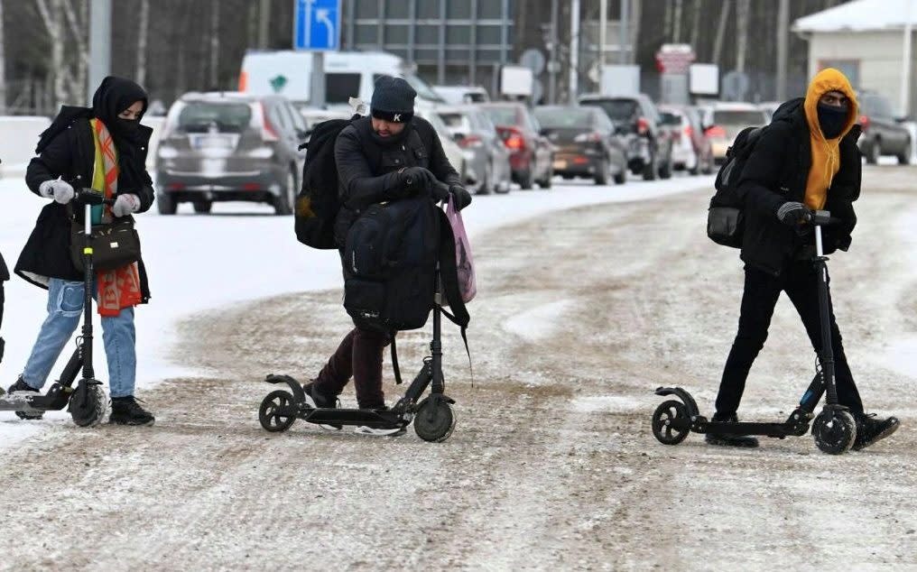 Migrants crossing the Russian border into Finland