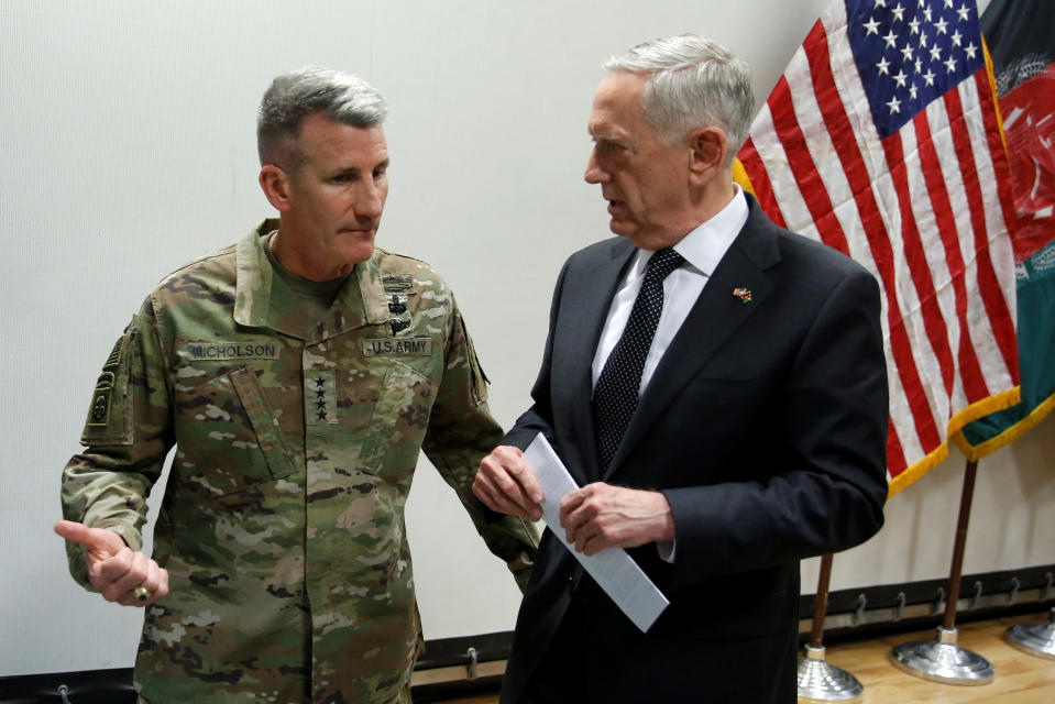 U.S. Defense Secretary James Mattis (R) chats with U.S. Army General John Nicholson (L), commander of U.S. Forces Afghanistan, after a news conference at Resolute Support headquarters in Kabul, Afghanistan April 24, 2017. REUTERS/Jonathan Ernst