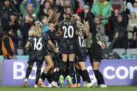 New Zealand's Hannah Wilkinson celebrates scoring the first goal with teammates during the Women's World Cup soccer match between New Zealand and Norway in Auckland, New Zealand, Monday, July 20, 2023. (AP Photo/Rafaela Pontes)