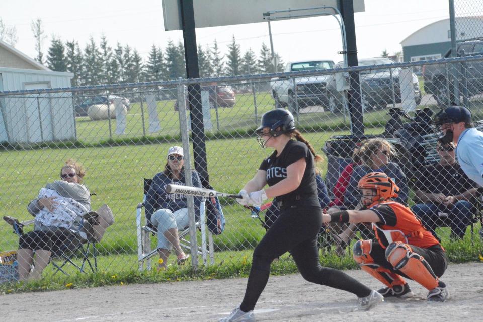 Chloe May gets a hit during a game last season. May led the Pickford team in home runs last season with seven.