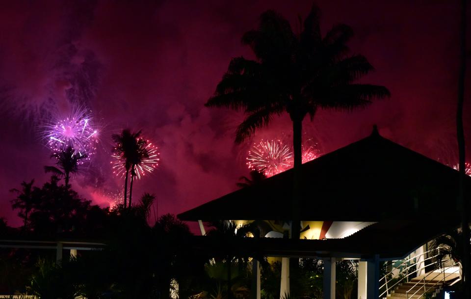 <p>Fireworks light the night sky over Abidjan during New Year celebrations on January 1, 2018. (Photo: Issouf Sanogo/AFP/Getty Images) </p>