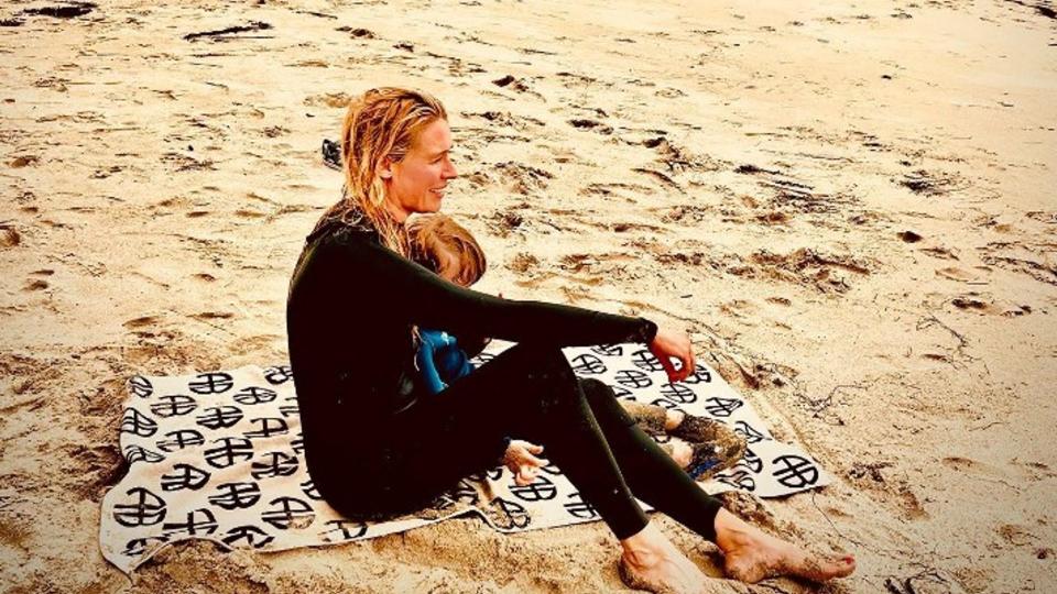 Cat Deeley and son on beach