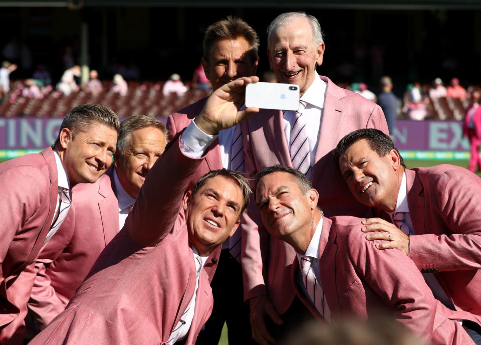 Picture perfect: Warne looked fresh-faced back in January with colleagues in Sydney