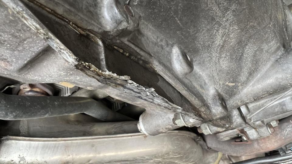 scraped up porsche 911 undercarriage