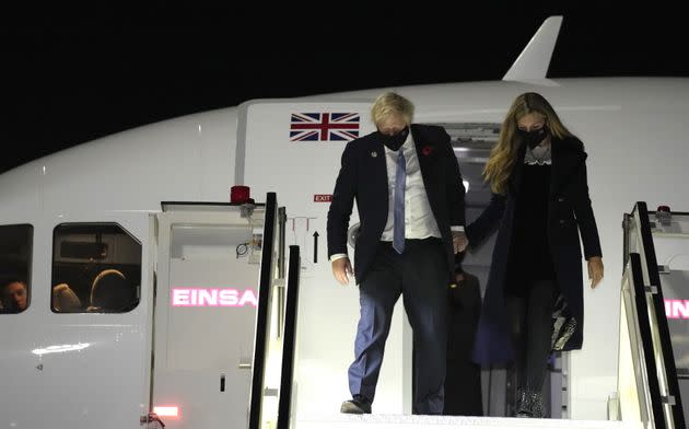 Johnson and his wife Carrie arrive at Rome's Fiumicino Airport ahead of the G20 summit in Rome, before they headed to Glasgow. (Photo: Kirsty Wigglesworth via PA Wire/PA Images)