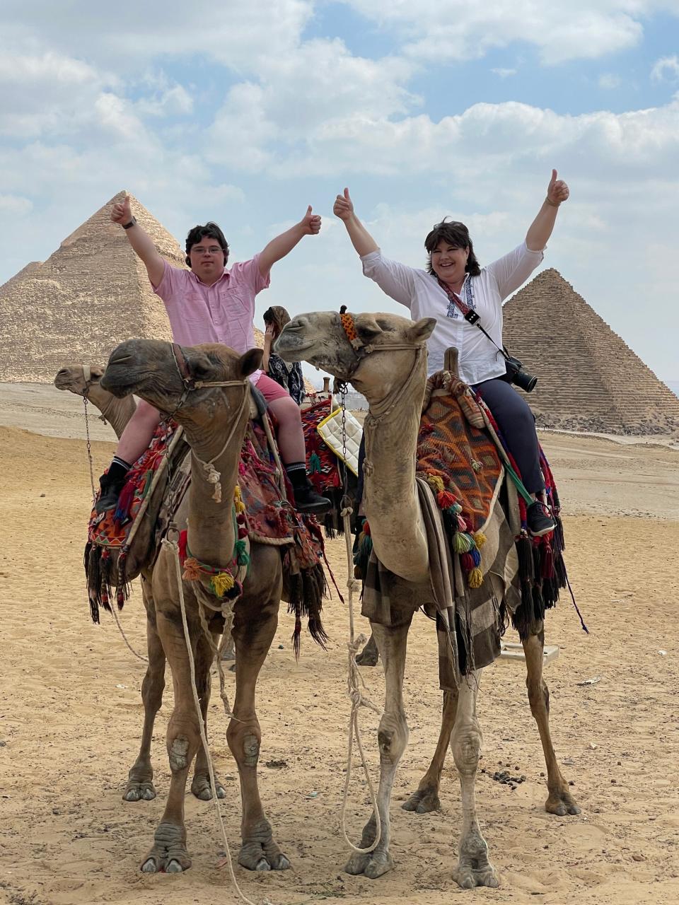 Riding camels by the pyramids of Egypt was just one of the adventures that Houston Vandergriff found as a tour host.