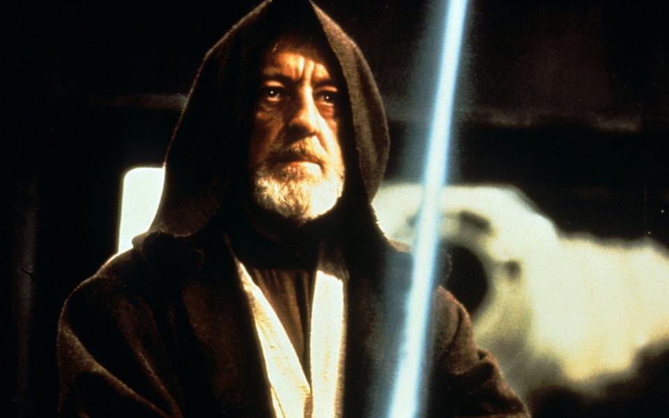 Alec Guinness as Obi-Wan Kenobi in the first Star Wars film - Alamy