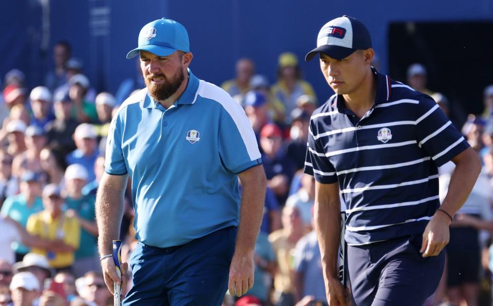 Shane Lowry of Team Europe and Collin Morikawa of Team United States