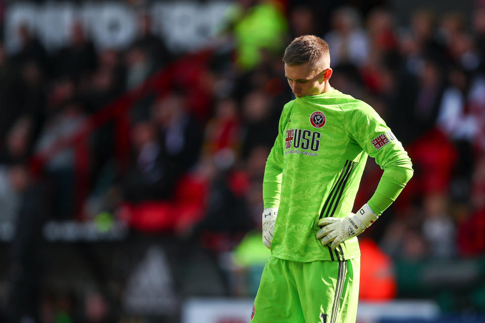 SHEFFIELD, ENGLAND - SEPTEMBER 28: A dejected Dean Henderson of Sheffield United reacts during the Premier League match between Sheffield United and Liverpool FC at Bramall Lane on September 28, 2019 in Sheffield, United Kingdom. (Photo by Robbie Jay Barratt - AMA/Getty Images)