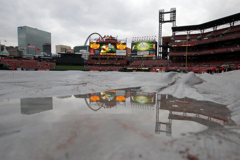 ST LOUIS, MO - OCTOBER 19: A rain tarp covers the infield at Busch Stadium prior to Game One of the MLB World Series between the Texas Rangers and St Louis Cardinals on October 19, 2011 in St Louis, Missouri. (Photo by Doug Pensinger/Getty Images)