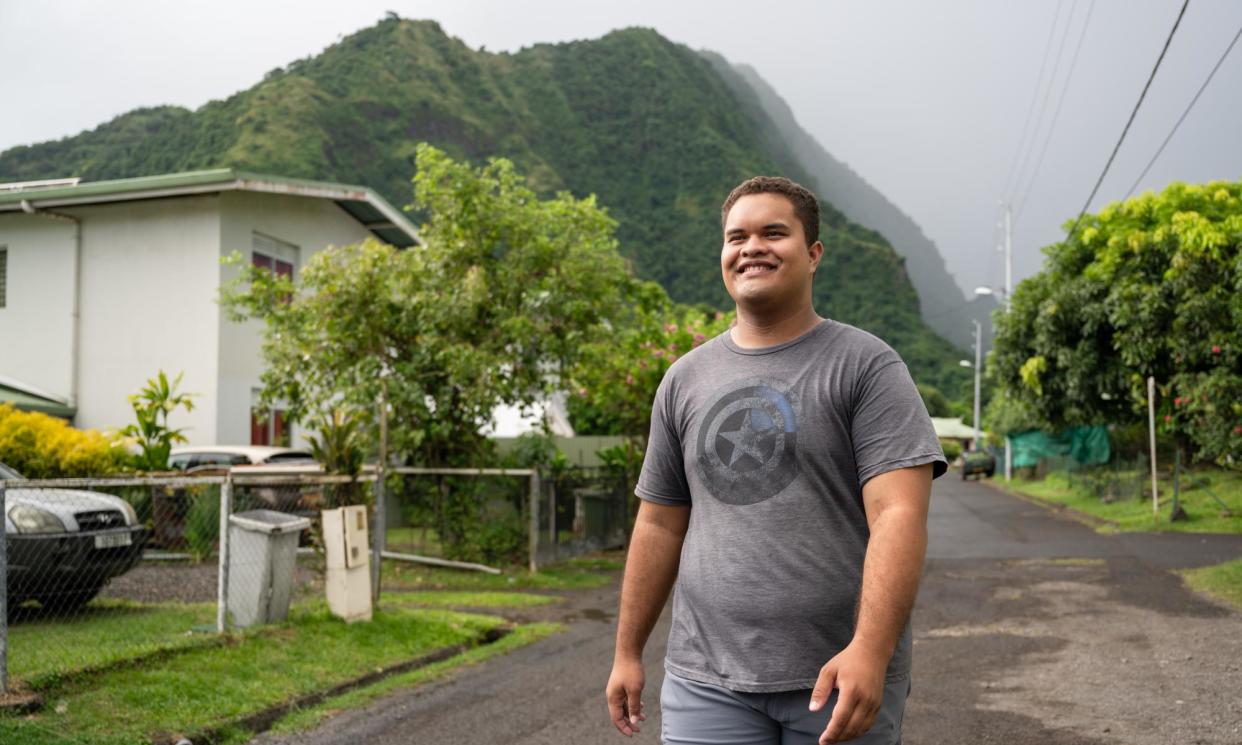 <span>24-year-old Wilson Poareu at his home in Papara, Tahiti, French Polynesia. "It rains all the time. But I love it, it’s cooler than other places in Tahiti and it's always green.”</span><span>Photograph: Atea Lee Chip Sao/The Guardian</span>