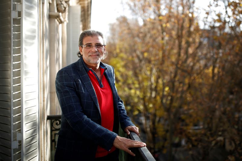 Khaled Youssef, member of the Egyptian parliament and film director, poses for a portrait inside his private appartment in Paris