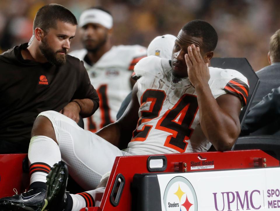 Cleveland Browns running back Nick Chubb (24) is taken from the field on a cart after suffering a knee injury against the Pittsburgh Steelers on Monday night in Pittsburgh.