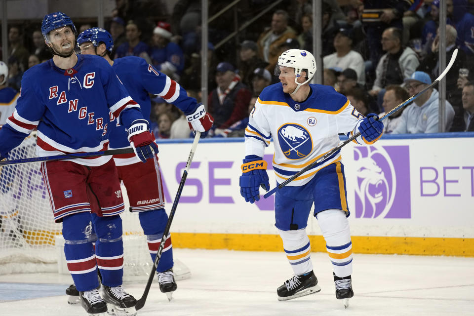 Buffalo Sabres' Jeff Skinner, right, reacts after a goal by teammate Alex Tuch (not shown) during the second period of an NHL hockey game against the New York Rangers, Monday, Nov. 27, 2023, in New York. (AP Photo/Seth Wenig)