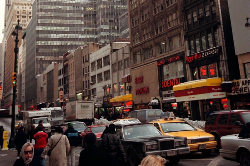 Vehicular and pedestrian traffic clogs the streets in Manhattan in New York City on January 11, 1996. On May 24, 1626, the Dutch West Indies Trading Co. bought the island of Manhattan from American Indians. File Photo by C.L.Cornish/UPI