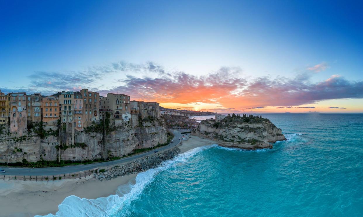 <span>Tropea’s old town and Rotonda beach. </span><span>Photograph: Makasana Photo/Alamy</span>