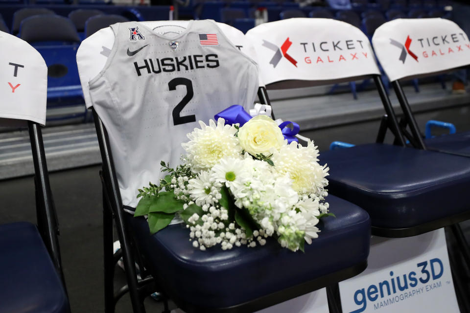 A jersey to honor Gianna Bryant sits on the UConn bench before the USA Women's National Team Winter Tour 2020 game between the United States and the UConn Huskies.