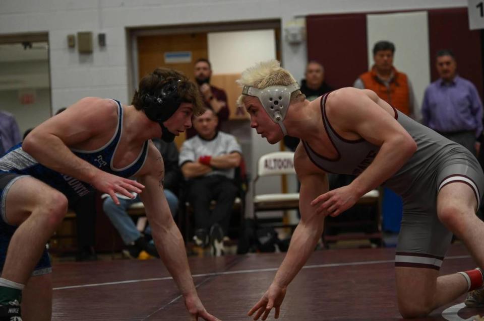 State College’s Pierson Manville, right, and Central Mountain’s Luke Simcox looking for a scoring opportunity in their 145 pounds PIAA Class 3A Northwest Regional final on Saturday, Feb. 24, 2024 in Altoona. Simcox topped Manville, 3-2, in ultimate tiebreaker.