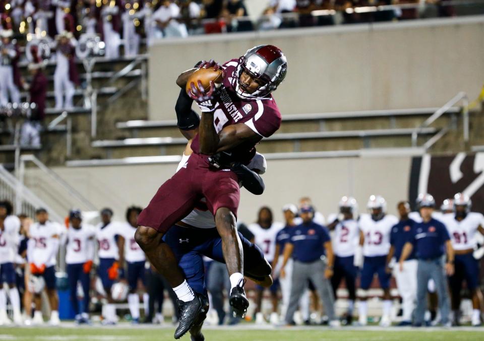 Tyrone Scott (19) of the Missouri State Bears catches a pass for a touchdown during a game against the UT Martin Skyhawks at Plaster Stadium on Thursday, Sept. 8, 2022. 