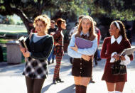 The Beverly Hills high school clique looks coordinated with preppy collared shirts and Cher’s signature high knee socks.