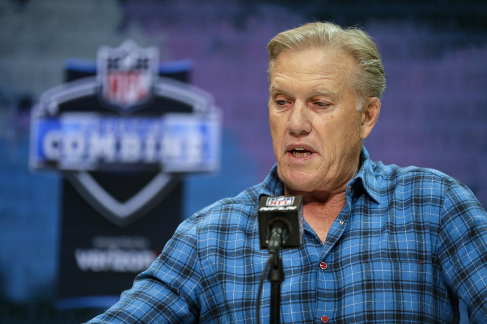FILE - In this Feb. 25, 2020, file photo, Denver Broncos president of football operations and general manager John Elway speaks during a press conference at the NFL football scouting combine in Indianapolis. Elway has selected a defensive player with his first draft pick six times in his nine drafts. (AP Photo/Michael Conroy, File)