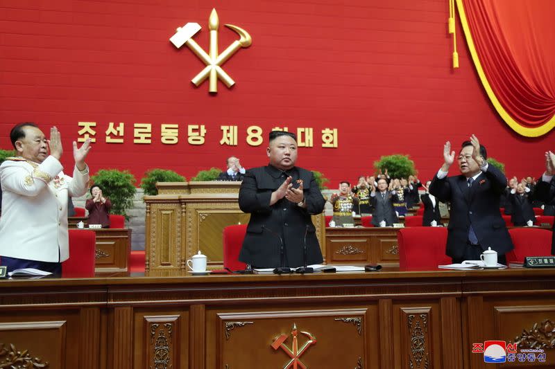 North Korean leader Kim Jong Un applauds at the 8th Congress of the Workers' Party in Pyongyang