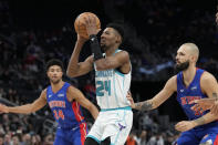 Charlotte Hornets forward Brandon Miller (24) attempts a basket during the first half of an NBA basketball game against the Detroit Pistons, Monday, March 11, 2024, in Detroit. (AP Photo/Carlos Osorio)