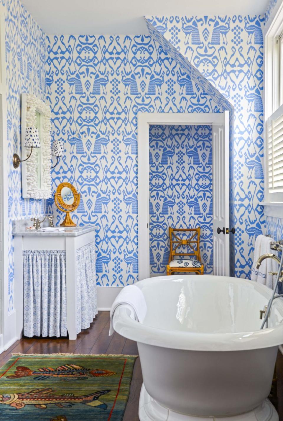 <p>Speaking of pattern-happy: This bathroom by <a href="https://www.housebeautiful.com/design-inspiration/house-tours/a30696941/charlotte-barnes-palmetto-bluff/" rel="nofollow noopener" target="_blank" data-ylk="slk:Charlotte Barnes;elm:context_link;itc:0;sec:content-canvas" class="link ">Charlotte Barnes </a>is a blue-and-white dream, and continuing the same Quadrille pattern into the adjacent room makes for a satisfying visual. </p>