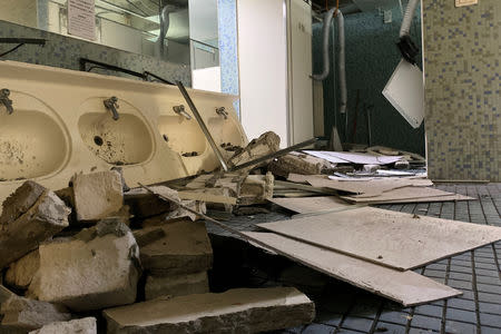 A damaged washroom is seen in a university after an earthquake in Taipei, Taiwan April 18, 2019. REUTERS/Tyrone Siu