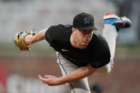 Miami Marlins starting pitcher Trevor Rogers works during the fifth inning of the team's baseball game against Atlanta Braves on Friday, May 27, 2022, in Atlanta. (AP Photo/John Bazemore)