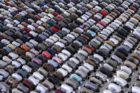 Muslim men attend a Friday prayer despite concerns of the new coronavirus outbreak, at a mosque during the first day of the holy fasting month of Ramadan in Lhokseumawe, in the religiously conservative province of Aceh, Indonesia, Friday, April 24, 2020. During Ramadan, which begins Friday, faithful Muslims normally fast during the day and then congregate for night prayers and share communal meals. (AP Photo/Zik Maulana)