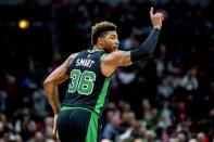 Dec 8, 2018; Chicago, IL, USA; Boston Celtics guard Marcus Smart (36) reacts after scoring during the first half against the Chicago Bulls at United Center. Patrick Gorski-USA TODAY Sports